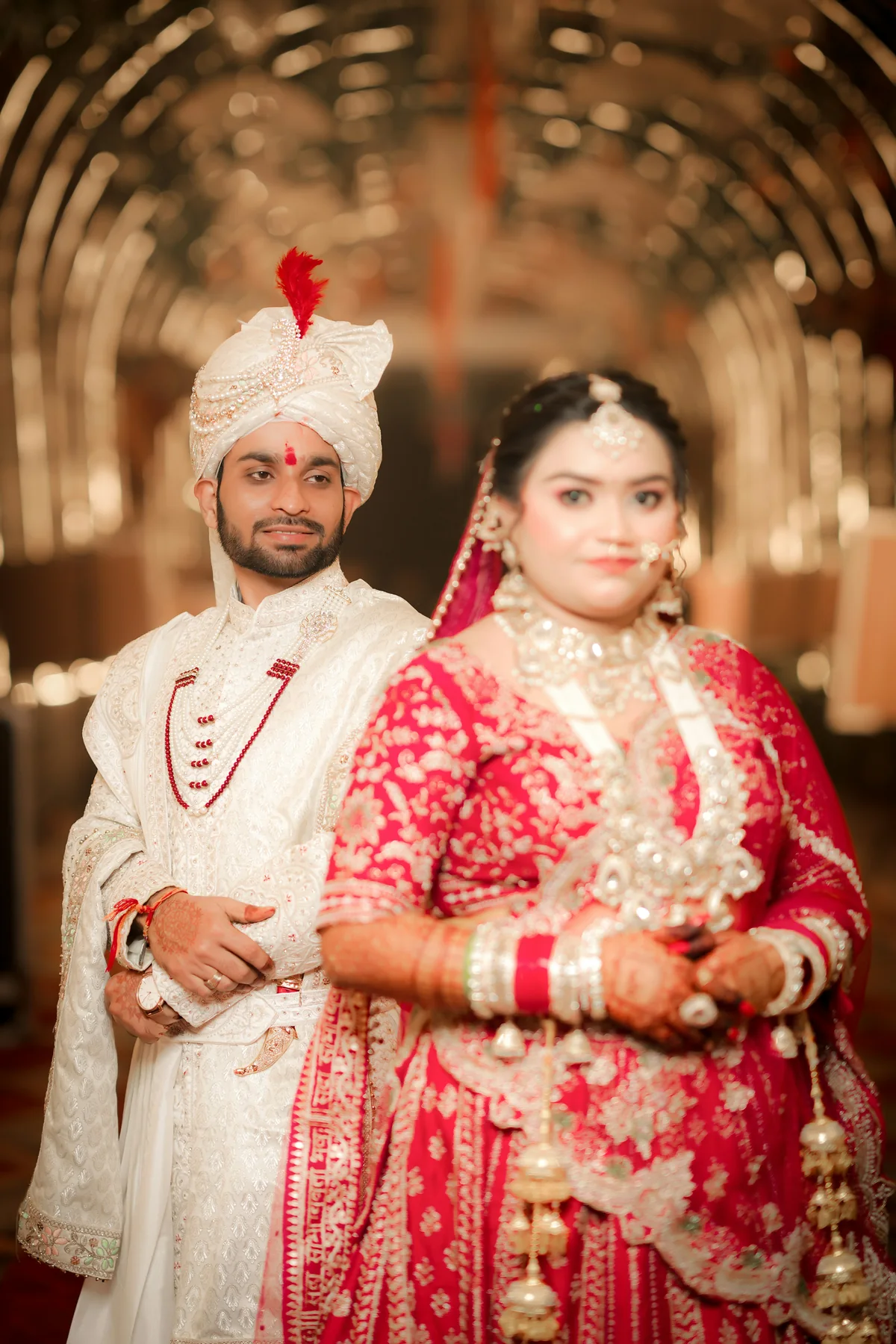 Indian bride and groom in traditional wedding attire